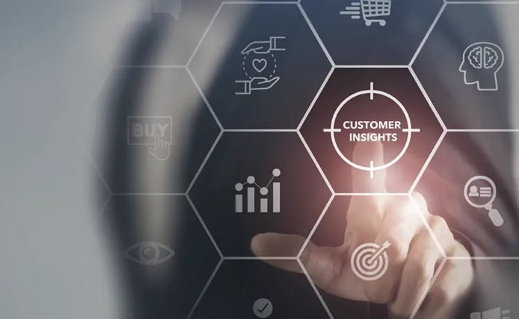 A hand pointing at a glowing "Customer Insights" icon on a futuristic digital interface